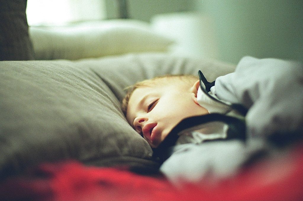 child experiencing pediatric sleep challenges